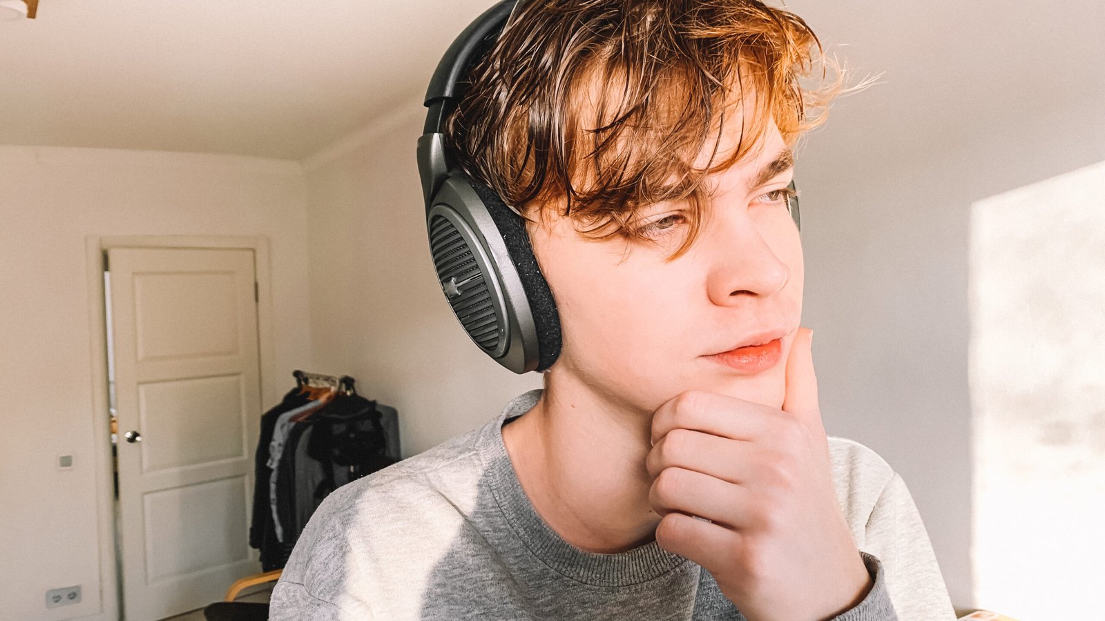 https://evmobilechargeoc.com/wp-content/uploads/2025/07/the-young-man-in-the-headphones-thought-about-it-2024-12-10-03-36-47-utc-scaled.jpg